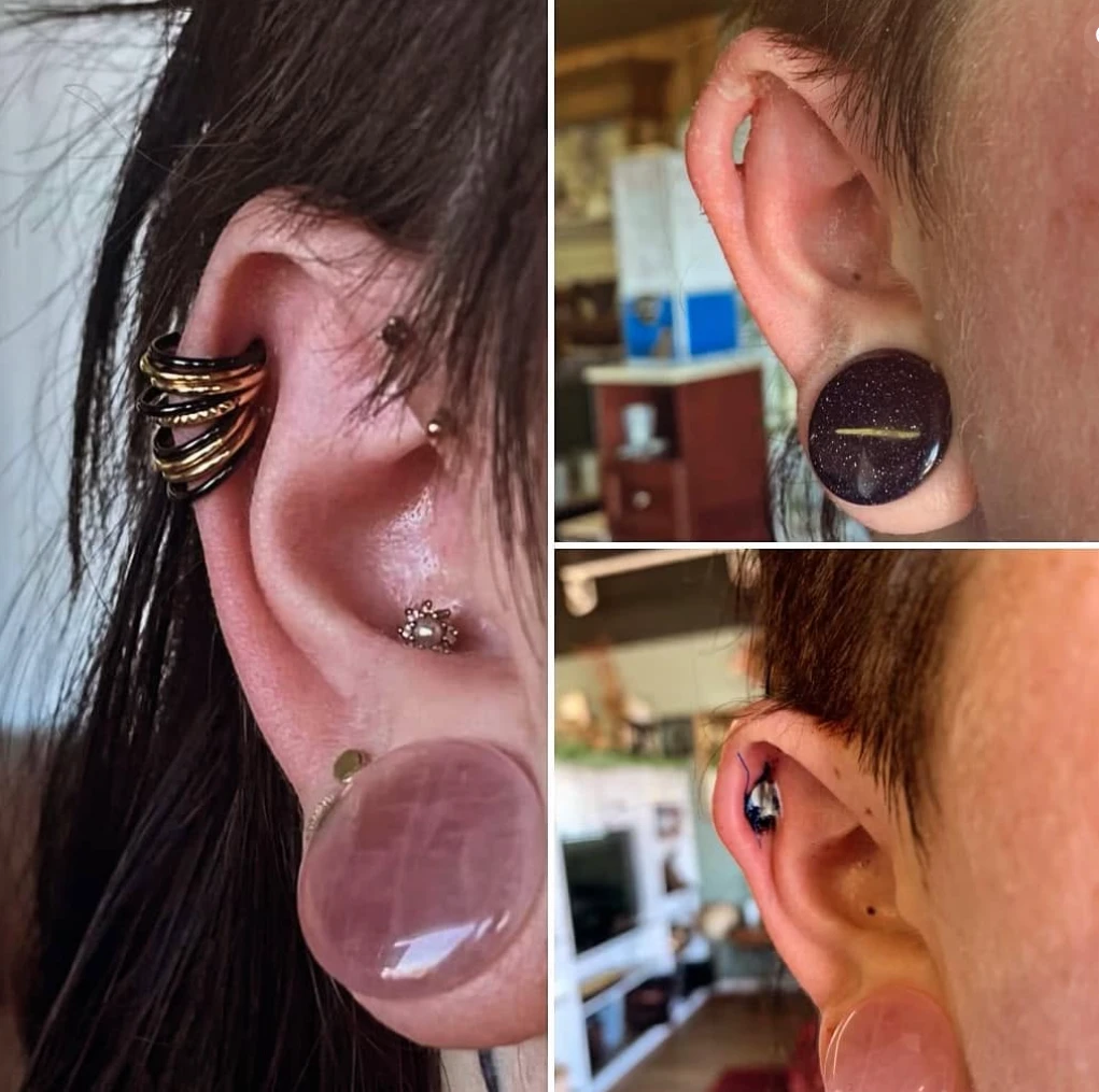 Stacked gold and black helix rings, conch stud, stretched lobes with stone plugs and a helix piercing, pierced in Glen Rose TX